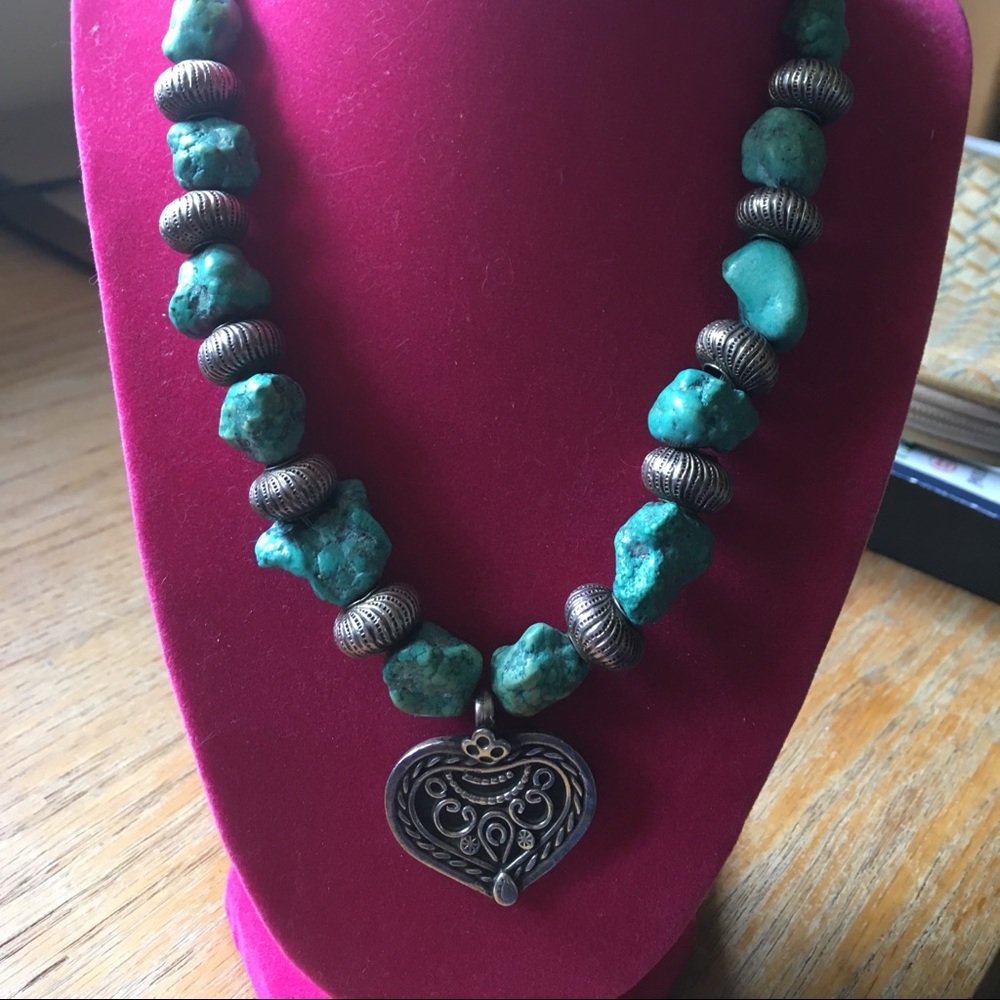 Turquoise with heart and ball elements. Vintage.